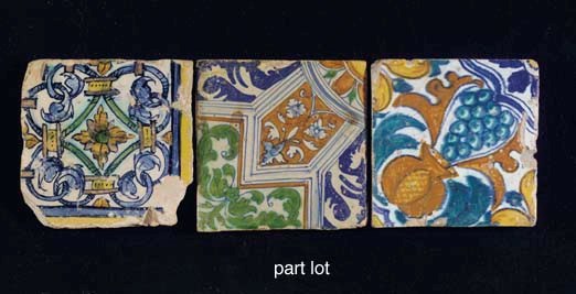 Four Antwerp polychrome ornamental tiles