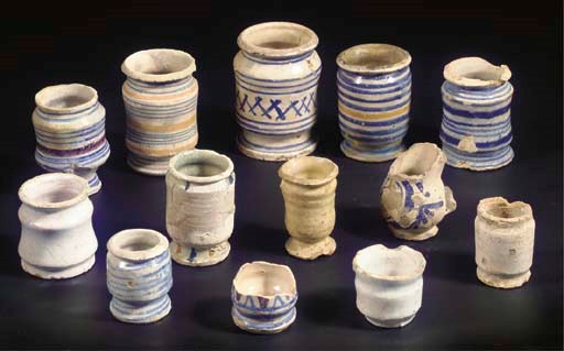 Thirteen various small Antwerp maiolica albarelli or gallipots
