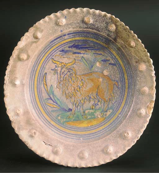 A Haarlem maiolica polychrome embossed border plate