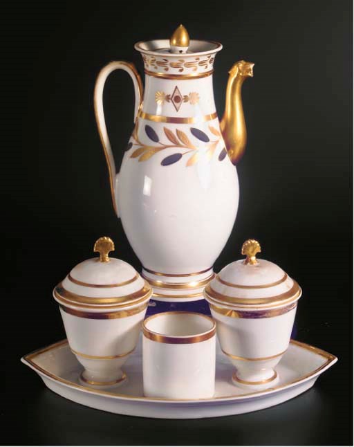 A Paris porcelain gilt baluster coffee pot and a cover and an almond-shaped covered confiturier