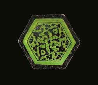 A hexagonal pottery tile