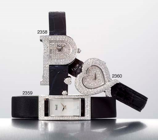 PIAGET. A LADY'S 18K WHITE GOLD AND DIAMOND-SET HEART-SHAPED WRISTWATCH