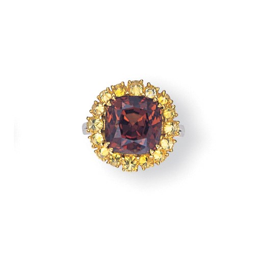 AN ALEXANDRITE AND COLOURED DIAMOND RING