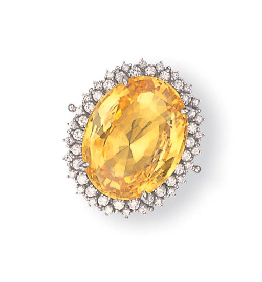 A YELLOW SAPPHIRE AND DIAMOND RING