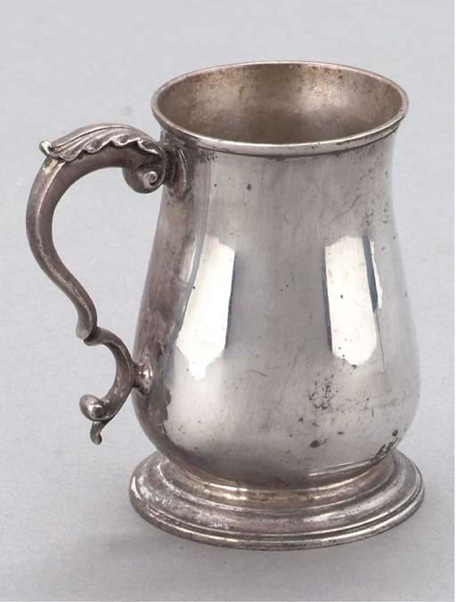 A GEORGE II SILVER BALUSTER MUG