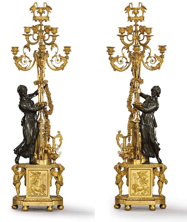 A PAIR OF LOUIS XVI ORMOLU AND PATINATED-BRONZE SIX-LIGHT CANDELABRA