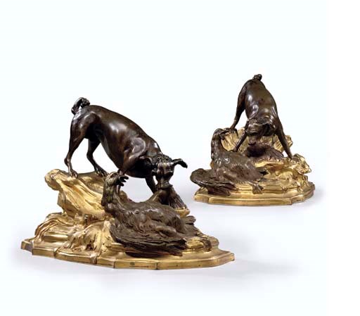 A PAIR OF LOUIS XV ORMOLU AND PATINATED-BRONZE PRESSE PAPIERS