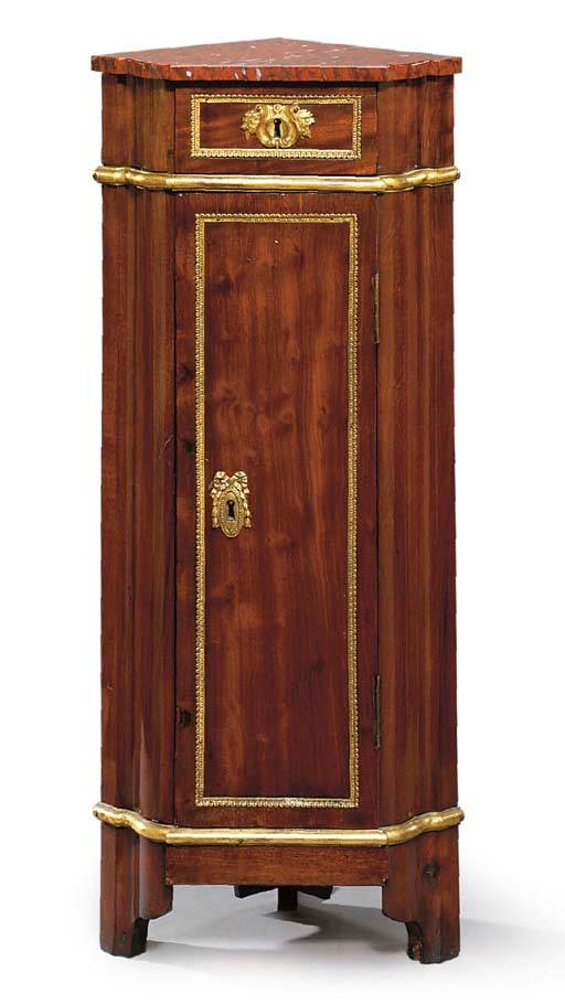 A LOUIS XVI ORMOLU-MOUNTED MAHOGANY PETITE ENCOIGNURE