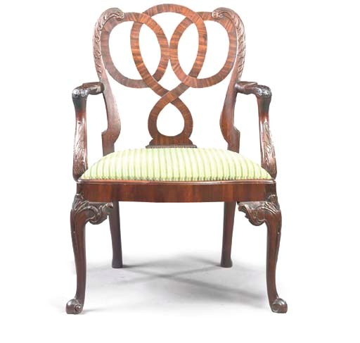 A GEORGE II MAHOGANY OPEN ARMCHAIR