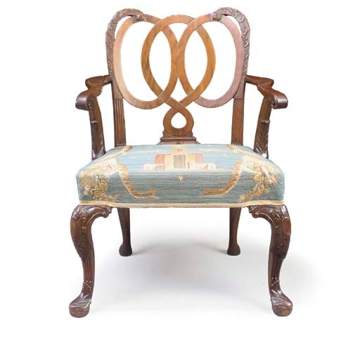 A GEORGE II MAHOGANY OPEN ARMCHAIR