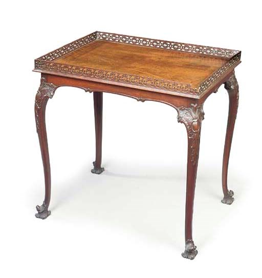 A GEORGE III MAHOGANY TEA-TABLE