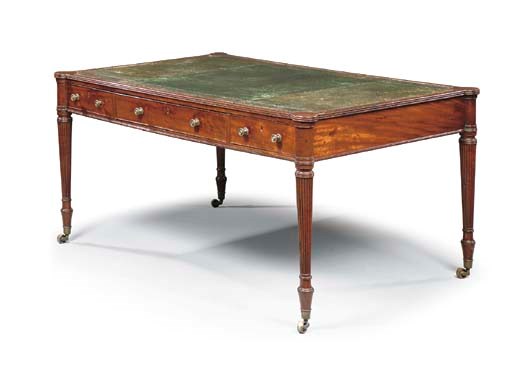 A LATE GEORGE III MAHOGANY WRITING-TABLE