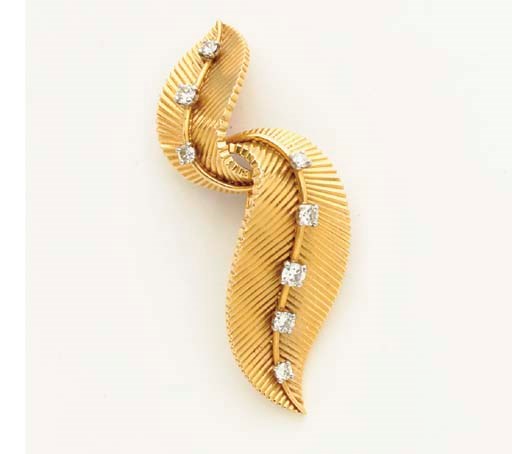 A DIAMOND AND 18K GOLD BROOCH, BY CARTIER