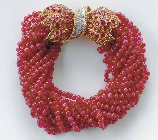 A RUBY, DIAMOND AND GOLD BRACELET