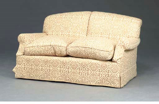 A CONTEMPORARY TAN AND CREAM COTTON COVERED SMALL SOFA,