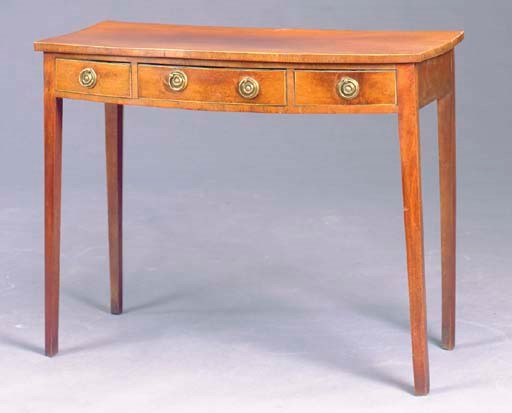 A LATE GEORGE III MAHOGANY BOW-FRONT DRESSING TABLE,