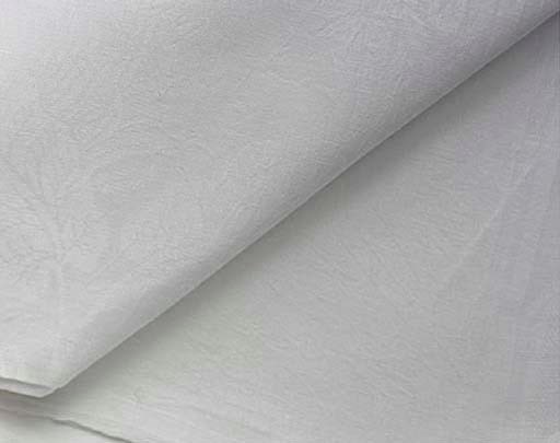 A PAIR OF WHITE LINEN DAMASK BANQUETING CLOTHS