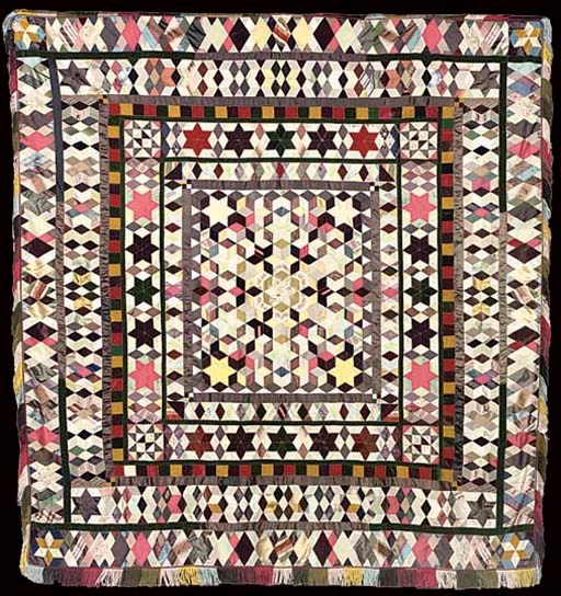 A PATCHWORK QUILT IN SILK AND VELVET
