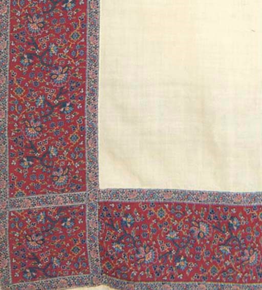 A WHITE WOOL TURNOVER SHAWL, PROBABLY ENGLISH, CIRCA 1830-40