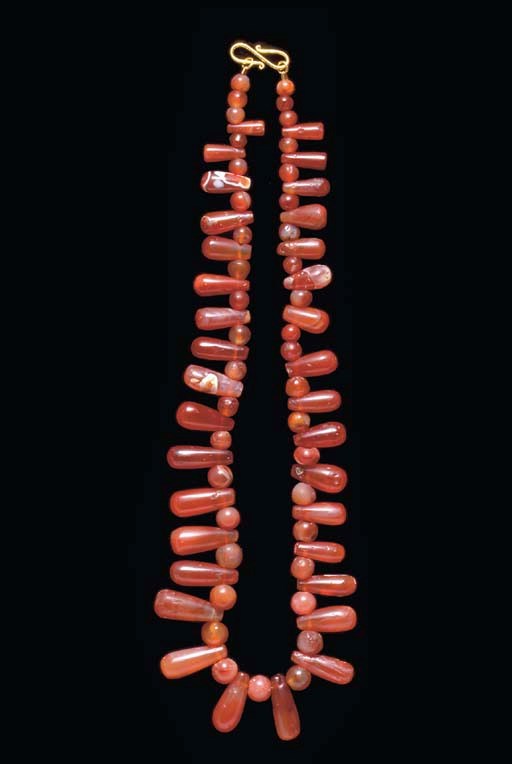 A WESTERN ASIATIC CARNELIAN BEAD NECKLACE