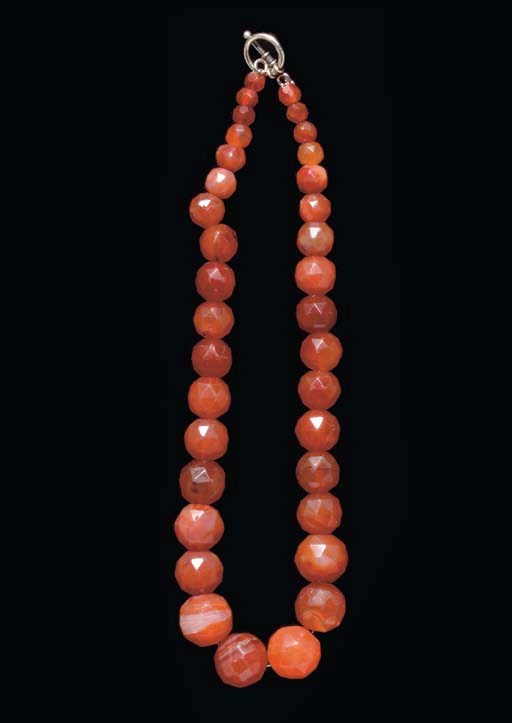 A WESTERN ASIATIC CARNELIAN BEAD NECKLACE