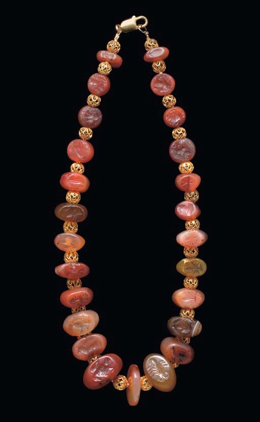 TWENTY-FOUR CARNELIAN AND AGATE SASANIAN SEALS