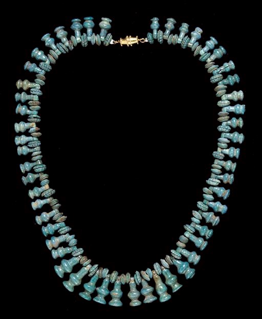 AN EGYPTIAN FAIENCE BEAD NECKLACE