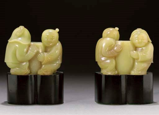 A pair of yellow jade models of the He-He Erxian, early 20th Century