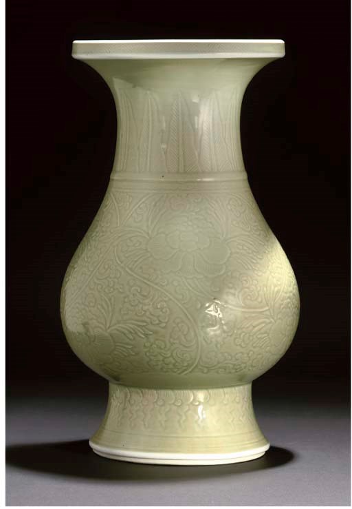A carved celadon ground pear-shaped vase, Kangxi