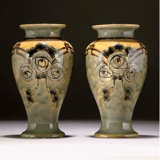 A PAIR OF ROYAL DOULTON VASES