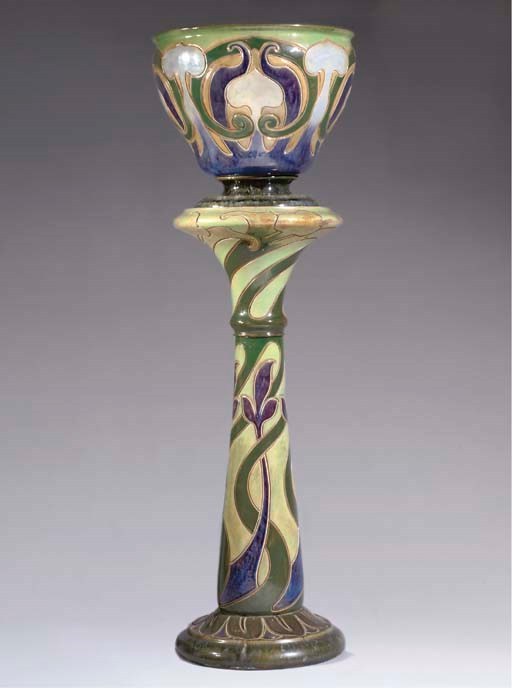 A ROYAL DOULTON JARDINIÈRE AND STAND