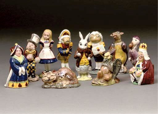 A SET OF BESWICK ALICE IN WONDERLAND FIGURES