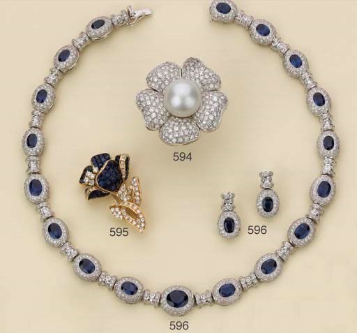 SPILLA IN ORO, ZAFFIRI E DIAMANTI, FIRMATA BOUCHERON