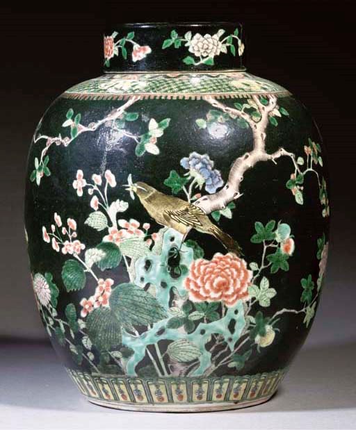 A large famille verte noire jar and cover, 19th century