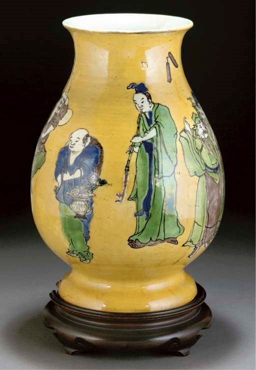 A famille verte yellow ground baluster vase, 19th century
