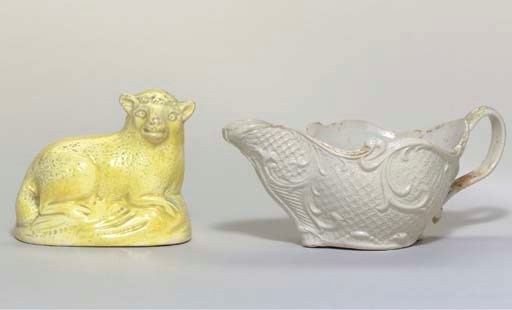 AN ENGLISH SALTGLAZED STONEWARE SAUCEBOAT