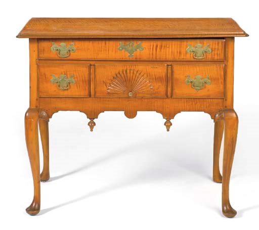 A QUEEN ANNE FIGURED MAPLE DRESSING TABLE