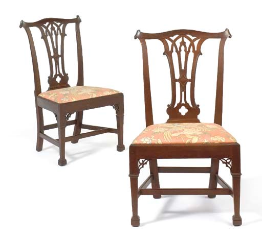 A PAIR OF GEORGE III CARVED MAHOGANY SIDE CHAIRS