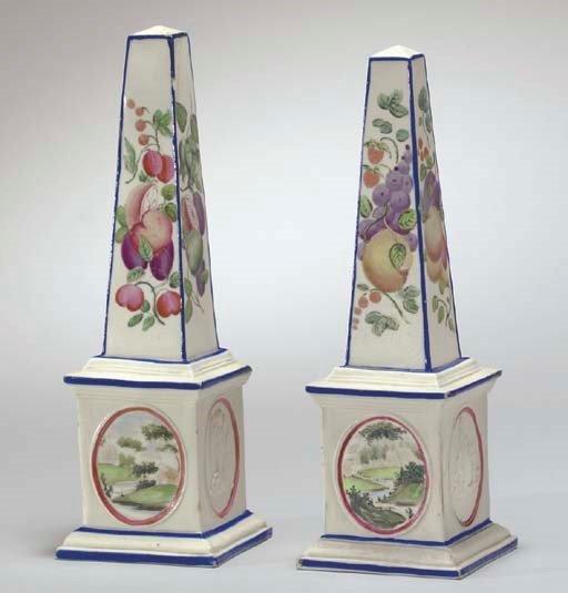 A PAIR OF STAFFORDSHIRE SMEAR-GLAZED STONEWARE OBELISKS