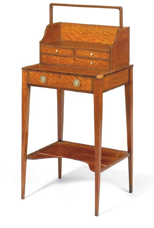 A GEORGE III SATINWOOD CHEVERET