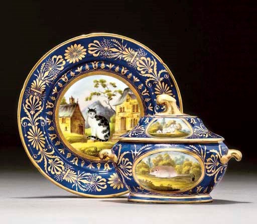 A COALPORT DARK-BLUE-GROUND OVAL SAUCE-TUREEN AND COVER AND A PLATE