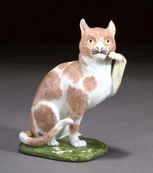 A MEISSEN MODEL OF A SEATED CAT