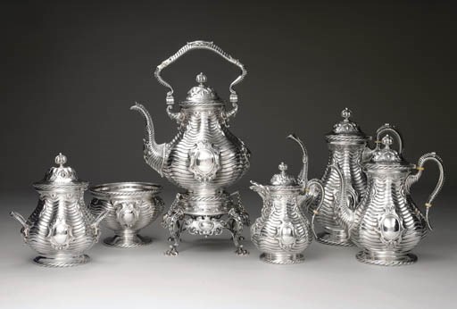 A SILVER SIX-PIECE TEA AND COFFEE SERVICE**