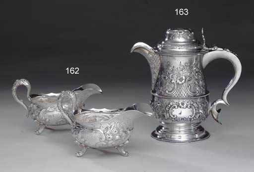 A SILVER BEER JUG