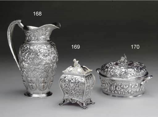 A SILVER TEA CADDY