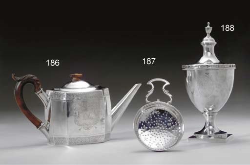 A SILVER TEAPOT