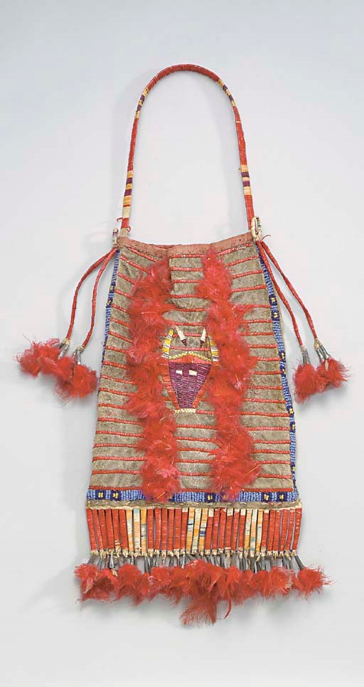 A SIOUX PICTORIAL BEADED AND QUILLED HIDE BAG