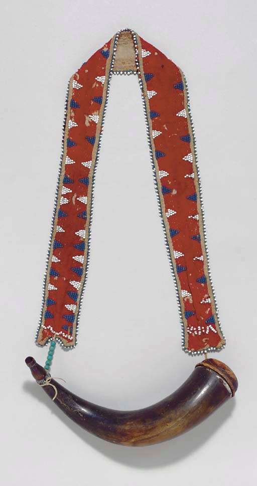 A NORTHERN PLAINS POWDER HORN WITH A PONY BEADED CLOTH STRAP