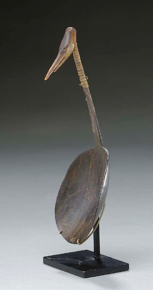 A SIOUX COW AND BUFFALO HORN EFFIGY SPOON