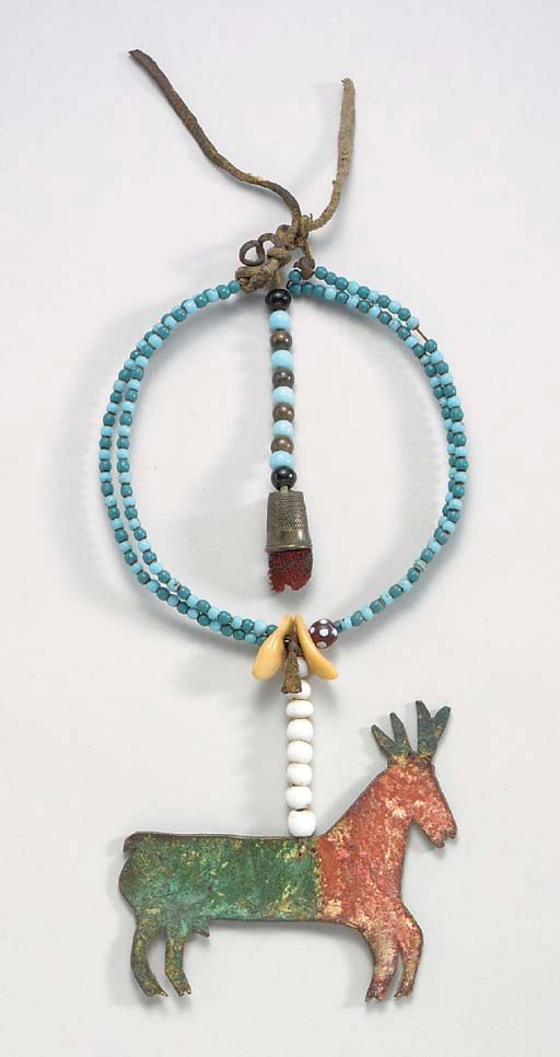 A CROW BEADED HIDE NECK ORNAMENT